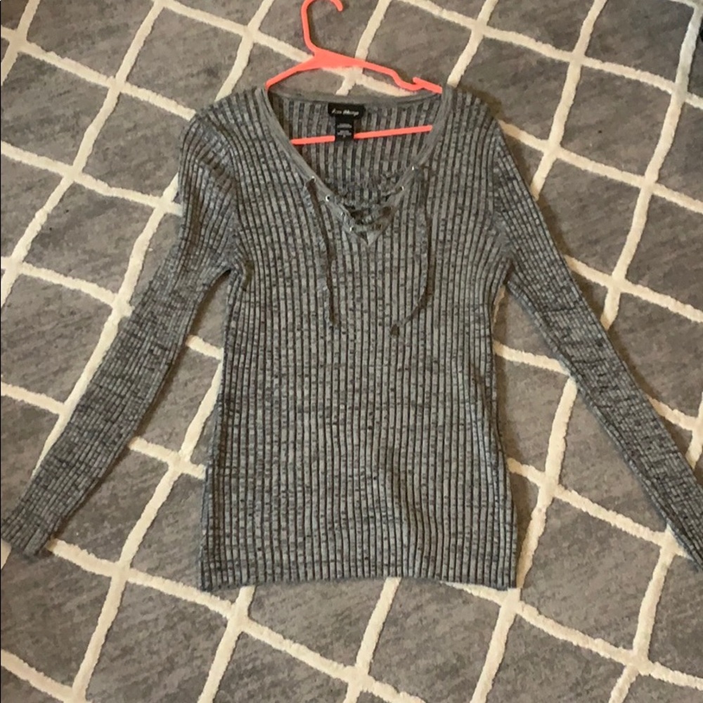 Sweater with lace up detail